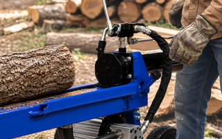 Log splitter preparing firewood for a log burner