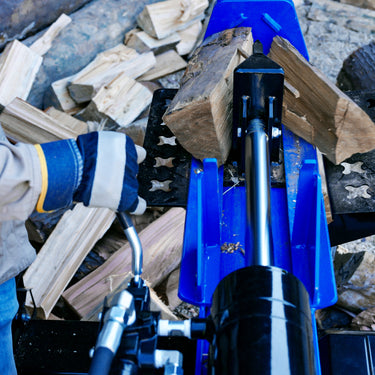 BILT HARD hydraulic log splitter splitting firewood outdoors