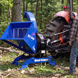 BILT HARD tractor wood chipper shredding branches outdoors