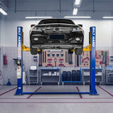 BILT HARD two-post car lift holding a sedan