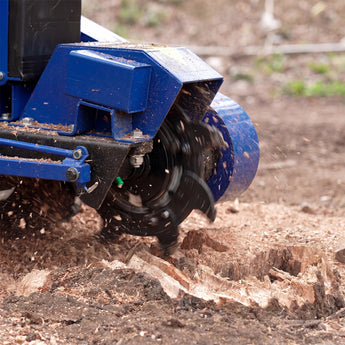 BILT HARD stump grinder cutting through tree stump