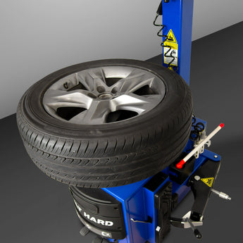 BILT HARD tire changer mounting wheel on turntable