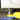 10,000 lbs two-post car lift with dual-point release and overhead design for auto and truck repair shops