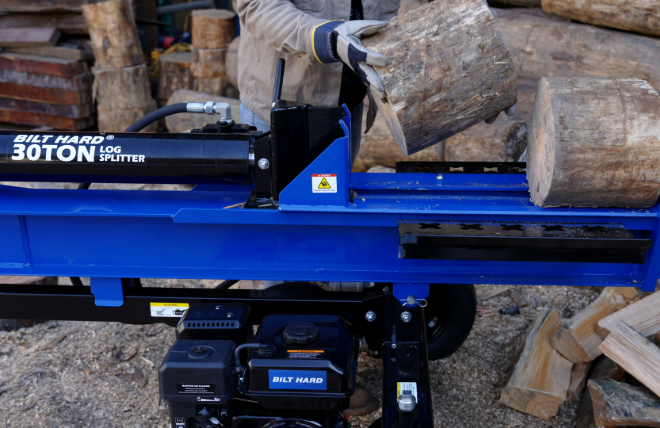 BILT HARD 30 ton log splitter splitting large wood logs outdoors