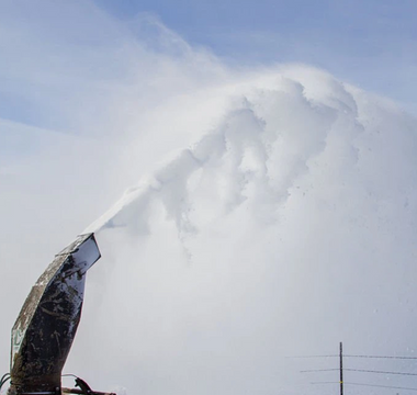 Effortless Snow Clearing: The Power of a Hydraulic Chute on Your Tractor
