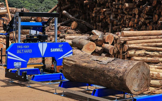 Bilthard 32-inch portable sawmill handling a large log