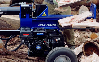 BILT HARD log splitter operator removing freshly split firewood