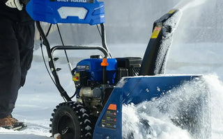 BILT HARD snow blower clearing deep snow from driveway
