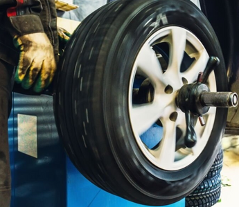 Essential Maintenance Tips for Your Swing Arm Tire Changer and Wheel Balancer