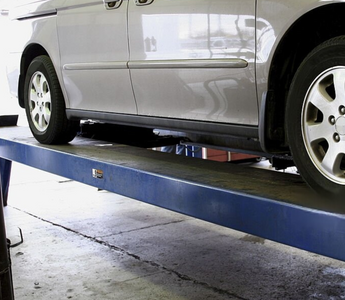 Safe & Efficient Parking: A Deep Dive into the 4-Post Car Storage Lift