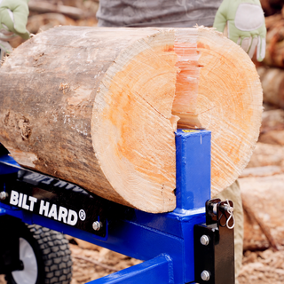 22-ton log splitter processing firewood for fire pit use