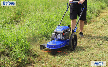 BILT HARD walk-behind brush mower clearing tall grass